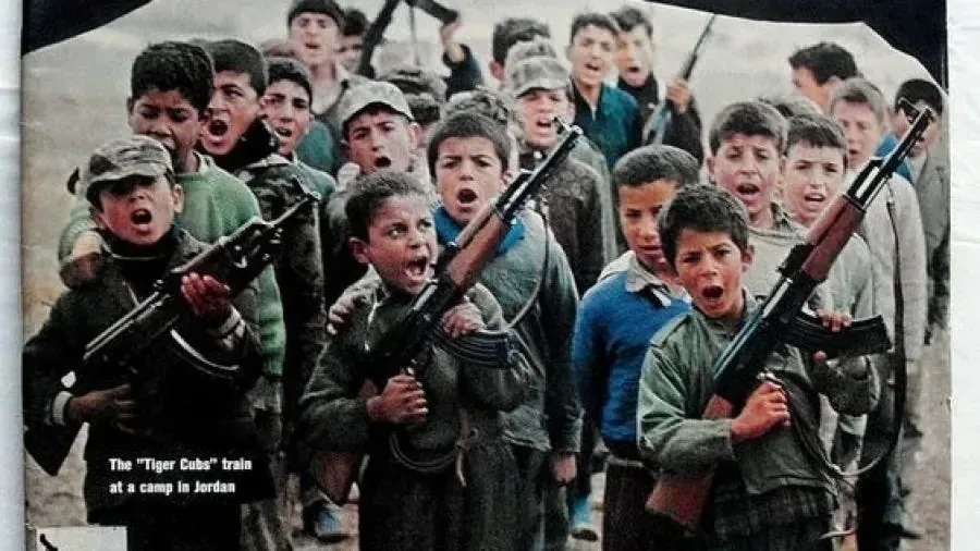 Radicalized Palestinian youth wielding Russian-supplied AK-47s. Source: jcpa.org.